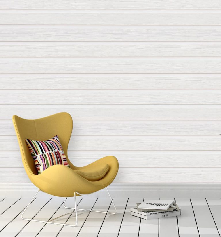 Stylish yellow chair on a white hardwood floor